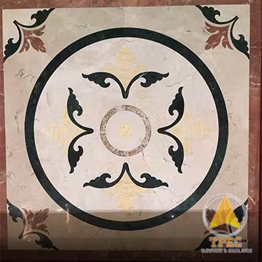 Mẫu sàn thang máy đá marble hoa văn tròn cánh hoa đen trên nền đá be