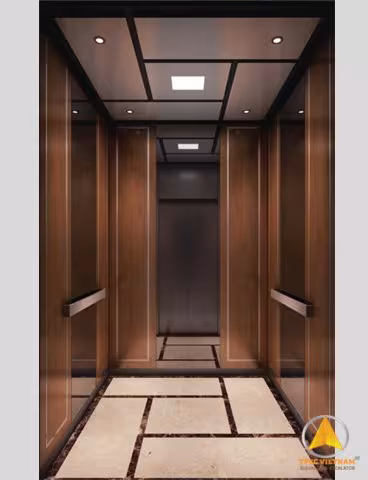 Mẫu cabin thang máy ốp vân gỗ nâu, tay vịn inox hai bên, sàn lát đá kem