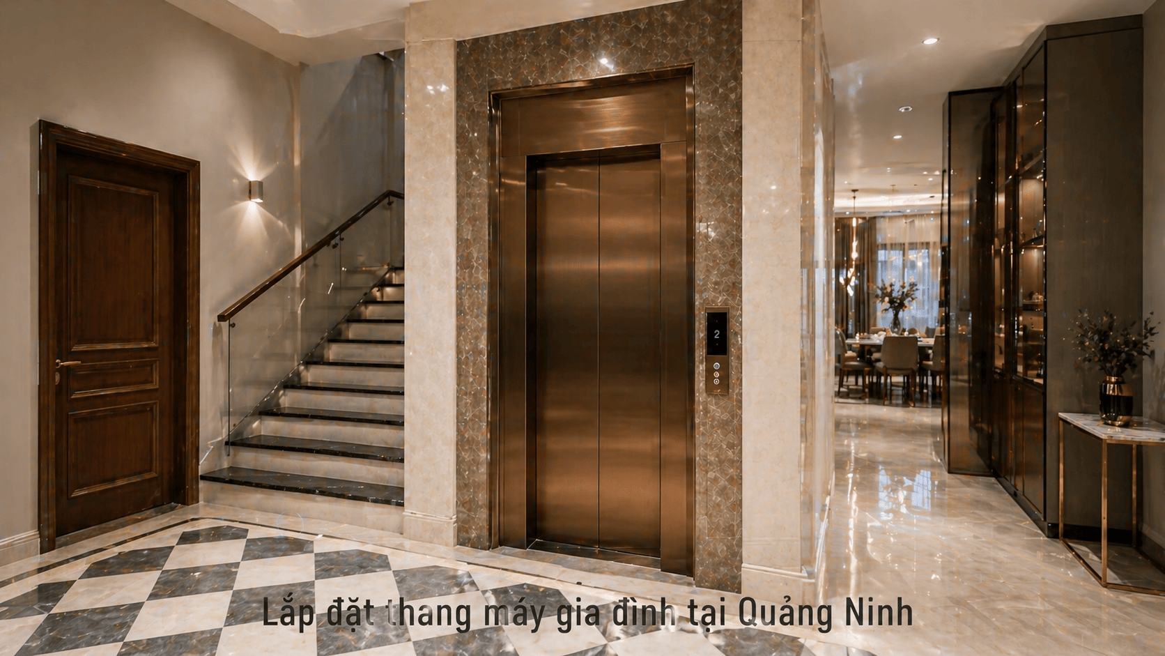 Thang máy gia đình mặt inox mạ đồng trong nhà phố Quảng Ninh, cạnh cầu thang lát đá